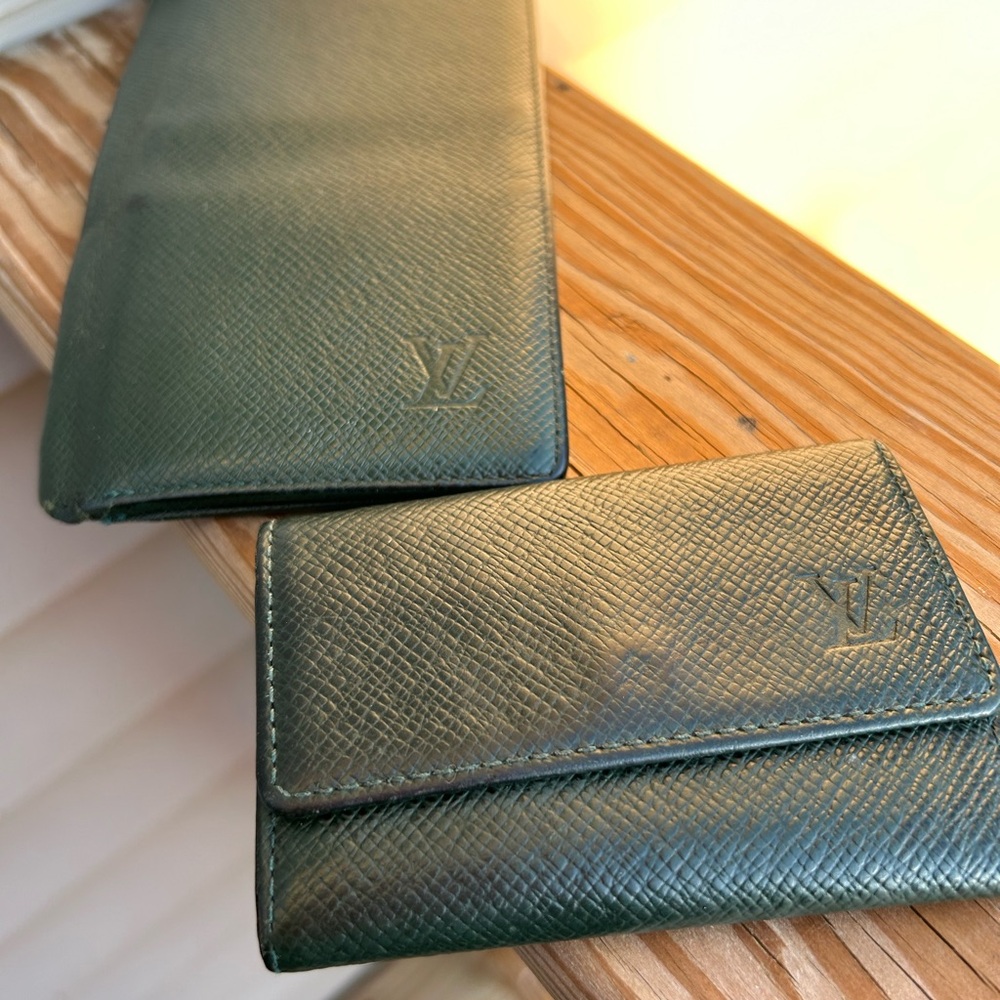 Louis Vuttion key holder and wallet.
